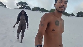 Black Cobra Emerges From Wet Sand To Penetrate Mulatto'S Anus In Steamy Video